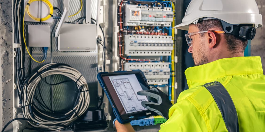 electrician working on control system